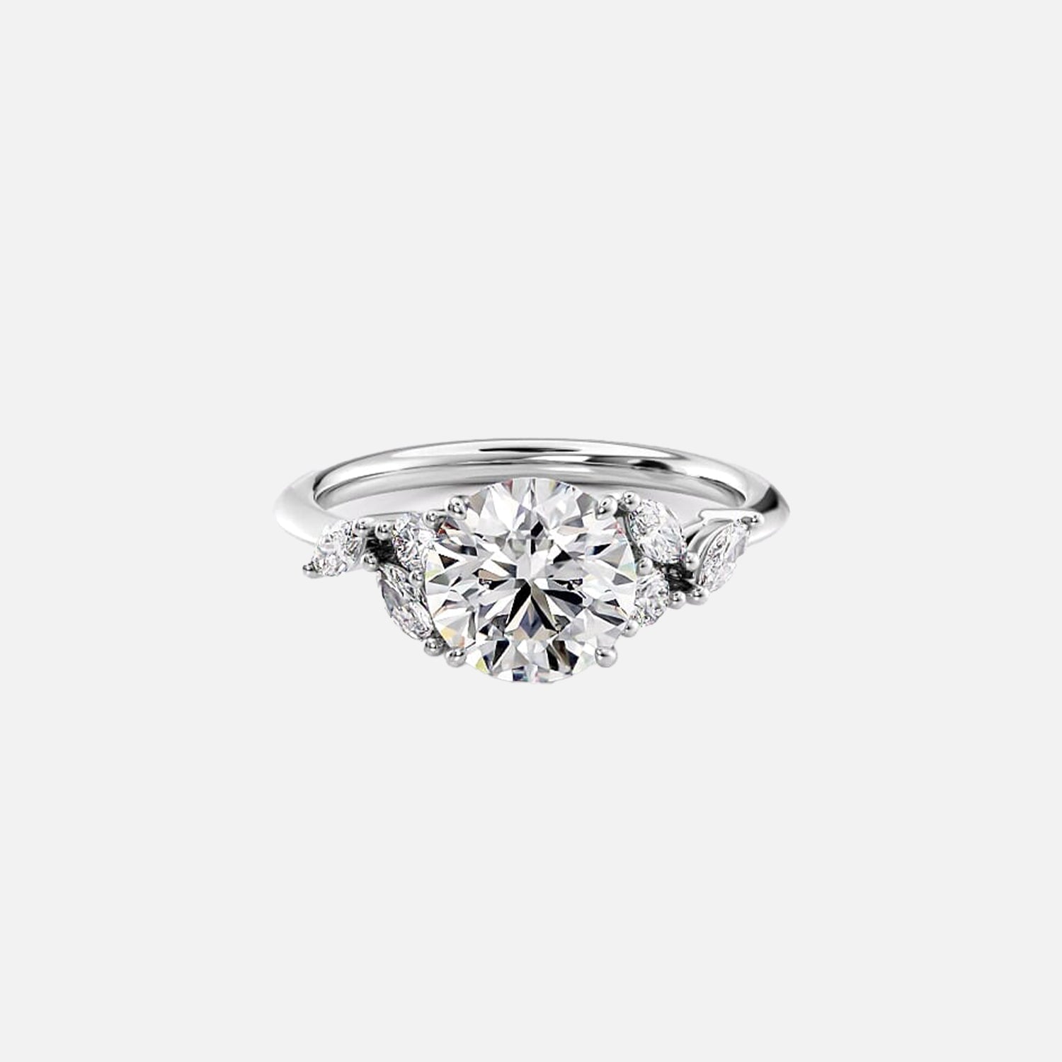 https://cdn.shopify.com/s/files/1/0575/1033/0564/files/Daisy_Moissanite_14k_White_Gold_Round_1.jpg?v=1725001367