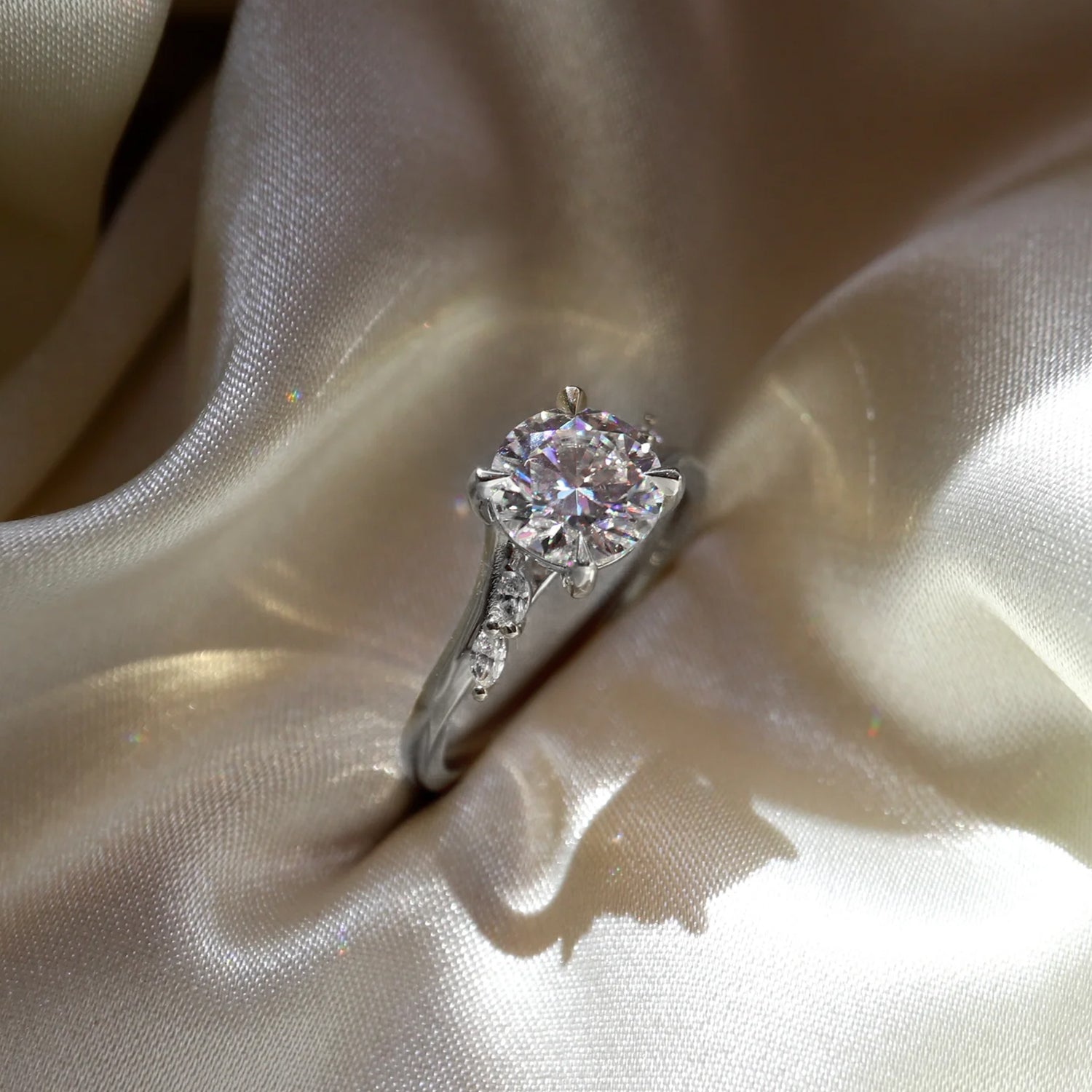 The Side Stone Elara Round Moissanite Ring - KNT - Engagement Rings, Wedding Bands & Fine Jewelry