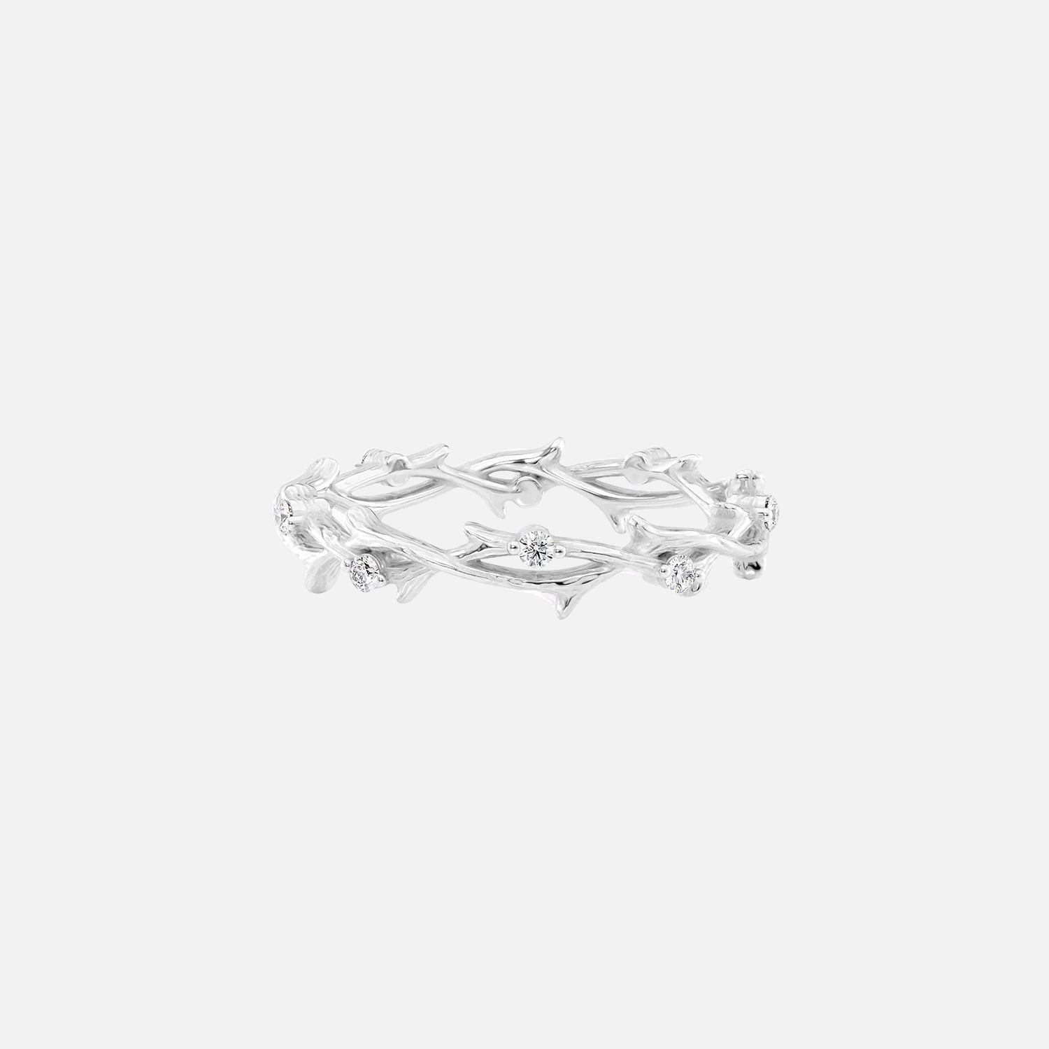 https://cdn.shopify.com/s/files/1/0575/1033/0564/files/Eternal_Spring_Moissanite_14k_White_Gold_1.jpg?v=1721620649