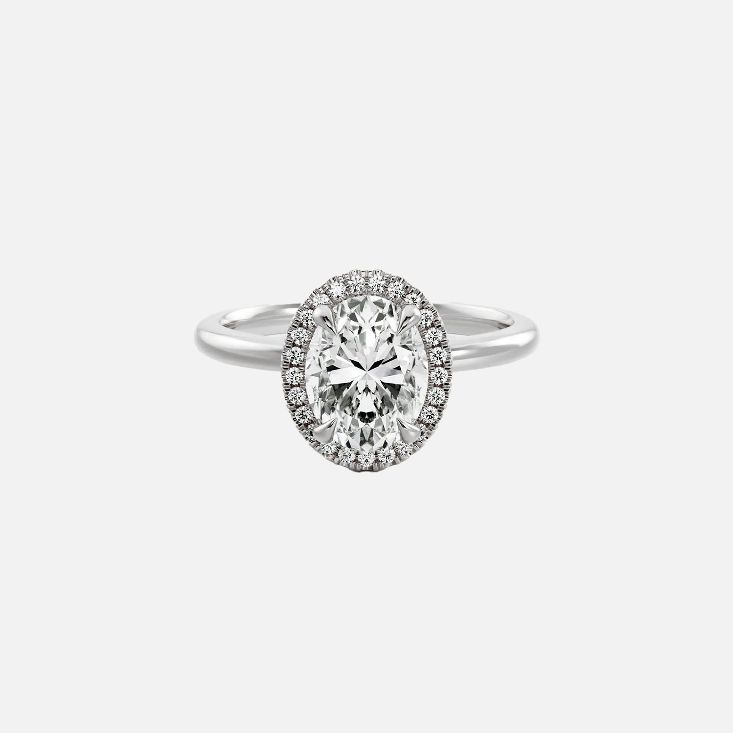 https://cdn.shopify.com/s/files/1/0575/1033/0564/files/Ophelia_Moissanite_14k_White_Gold_Oval_Final.jpg?v=1731913529