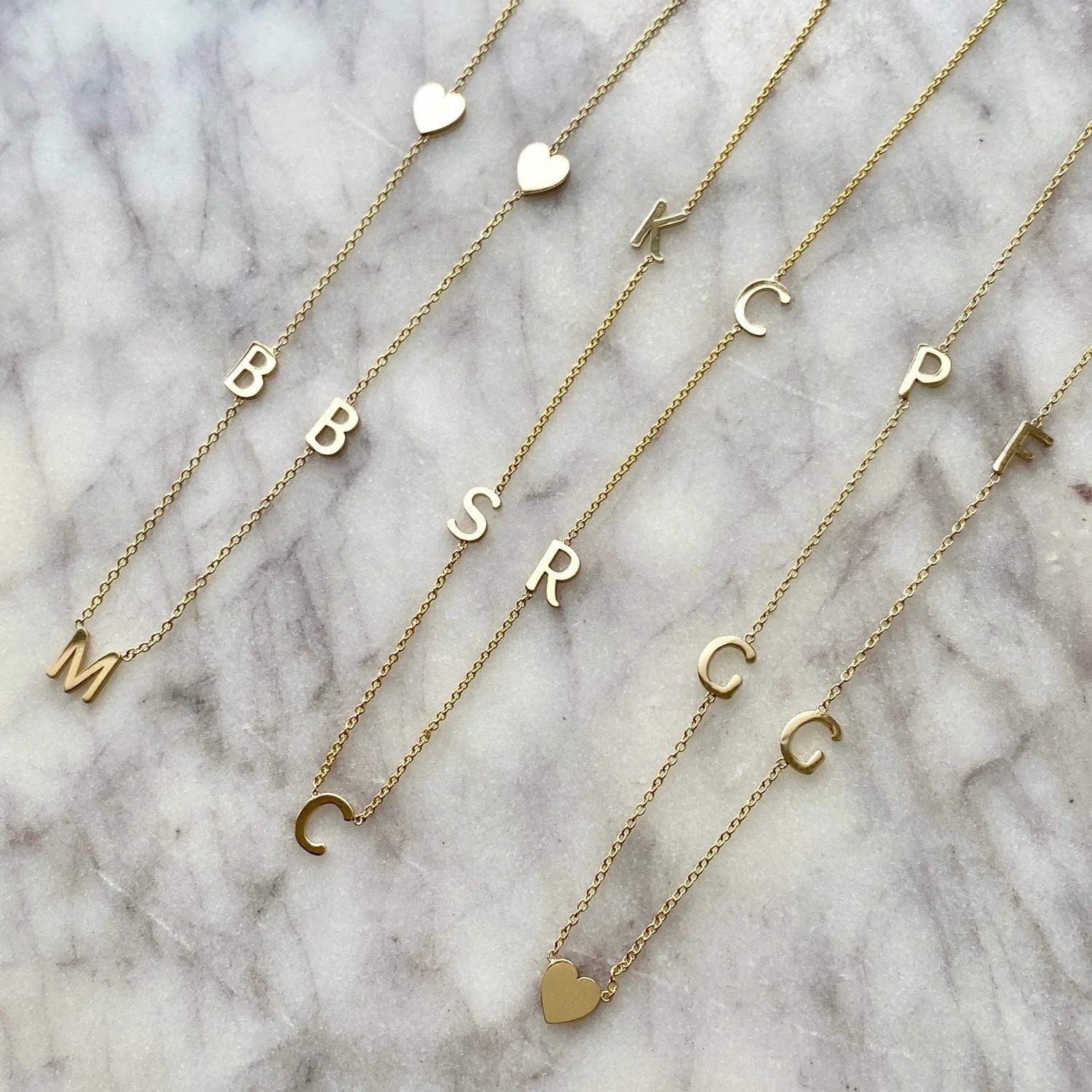 14K Gold Asymmetrical Multiple initials Necklace 18 + / 2